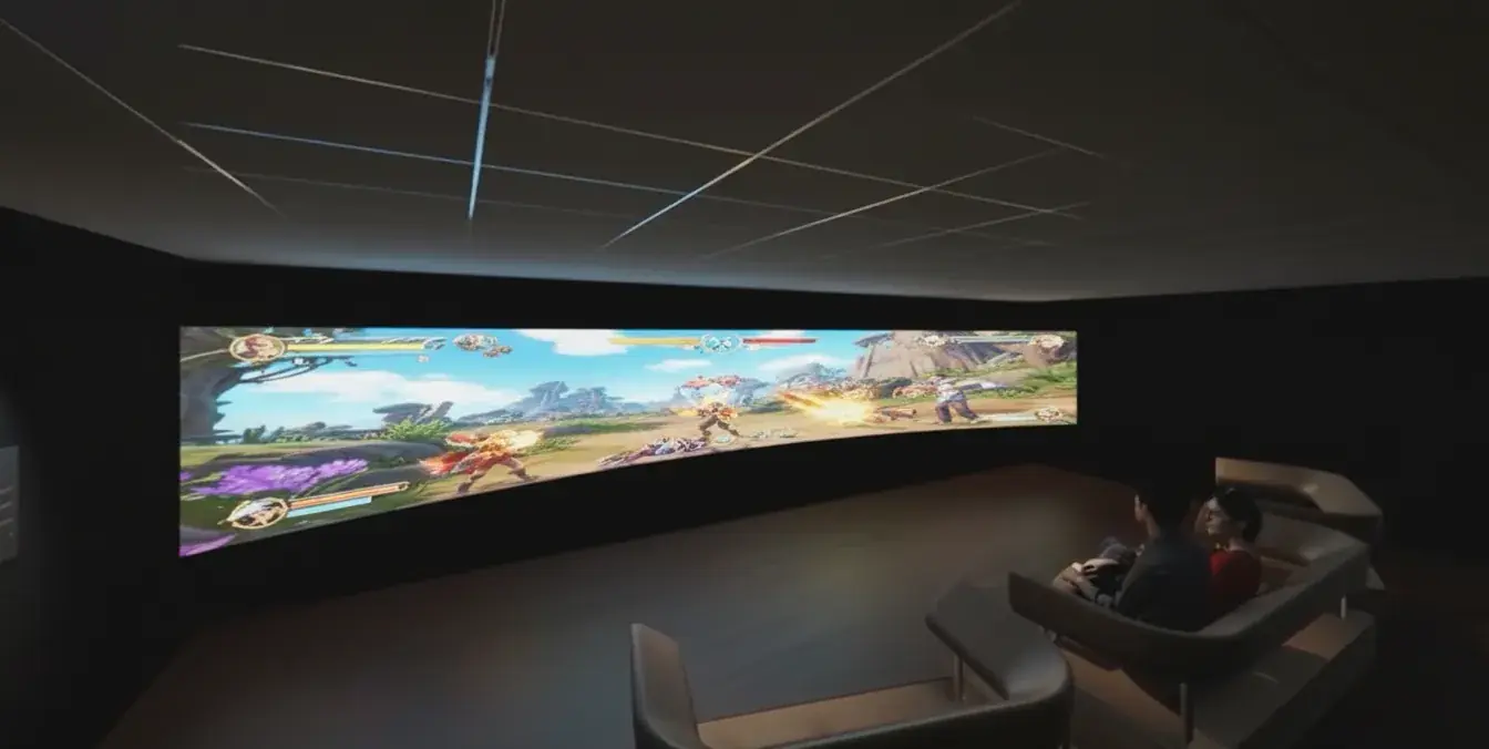 An experience-center lounge with a panoramic LED wall