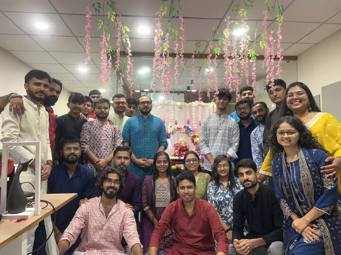 The team celebrating a festival at the studio