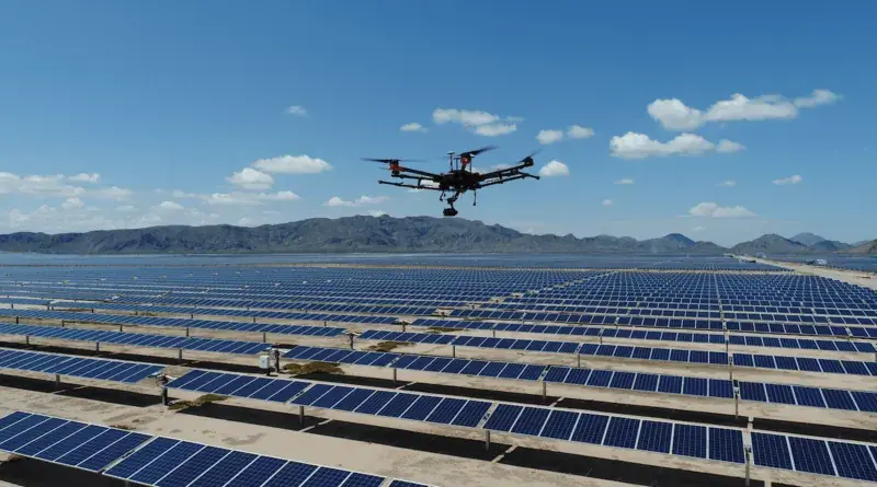 Drone flying over a large solar farm